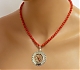 biżuteria artystyczna - Rozetka ażurowa z czerwonym koralem 